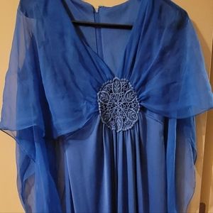 Blue dress with flowing cape